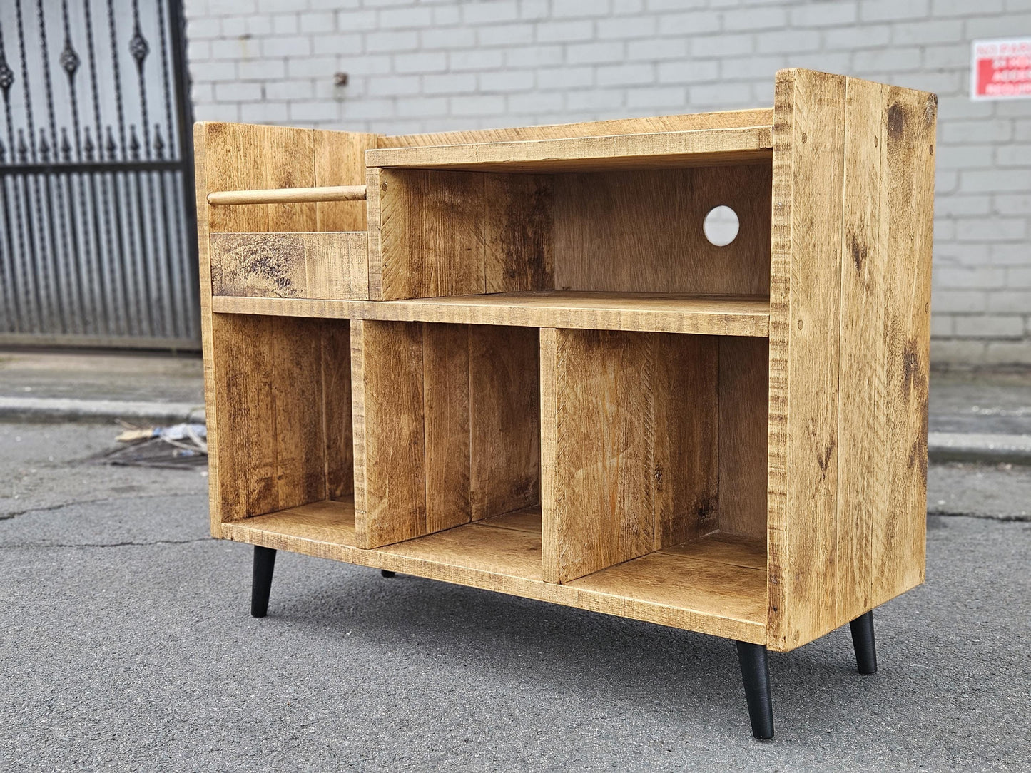 Rustic Vinyl Storage Unit with storage space for vinyl records, a flicking section for browsing, space for an amplifier and a deck for the turntable