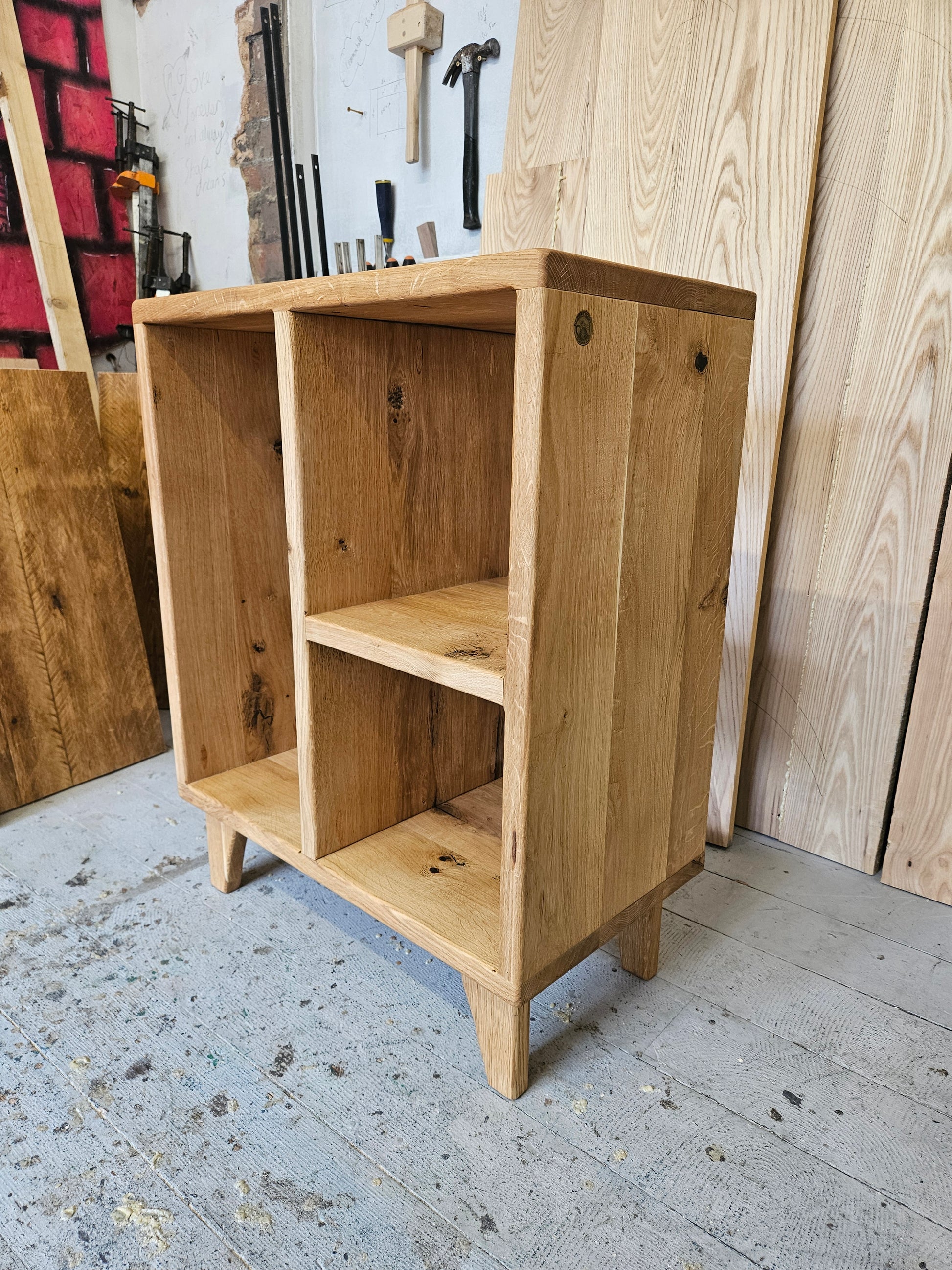 Bespoke Oak bookcase on legs. Natural wax and oil finish